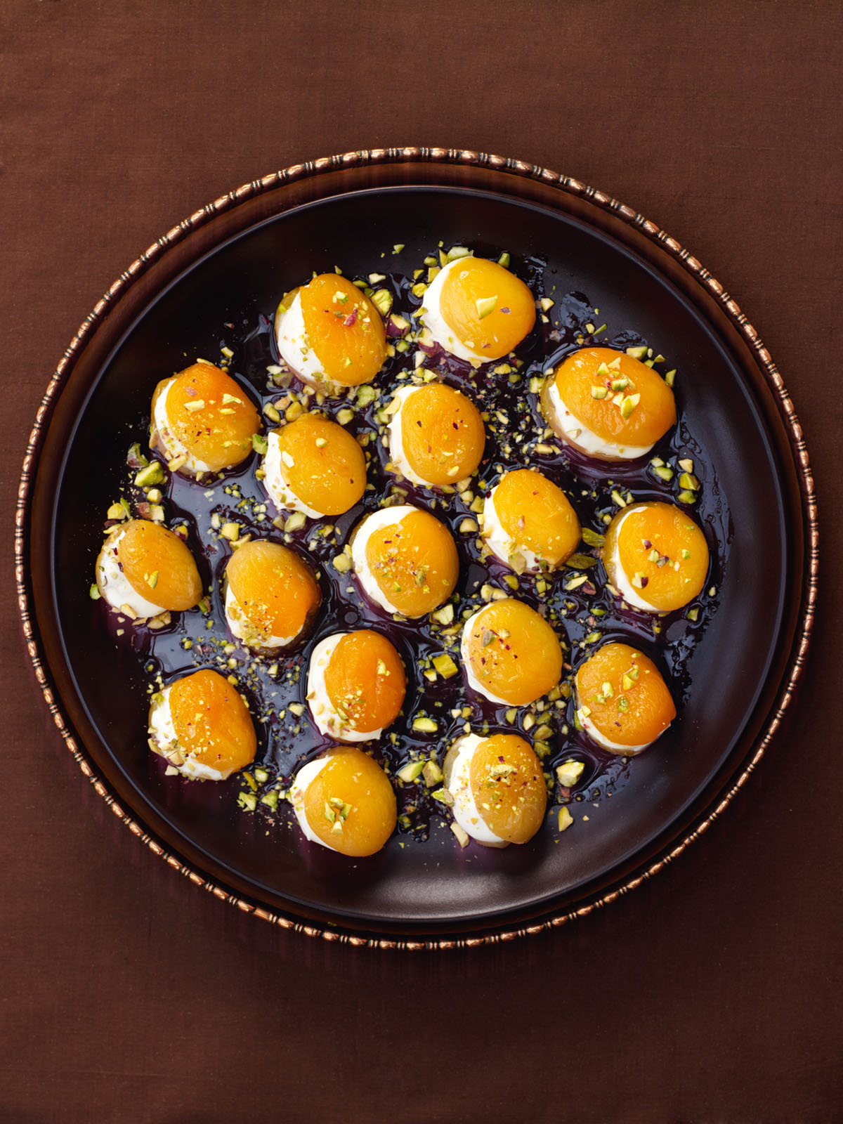 Poached Pistachio-Sprinkled Apricots Stuffed With Créme Fraiche