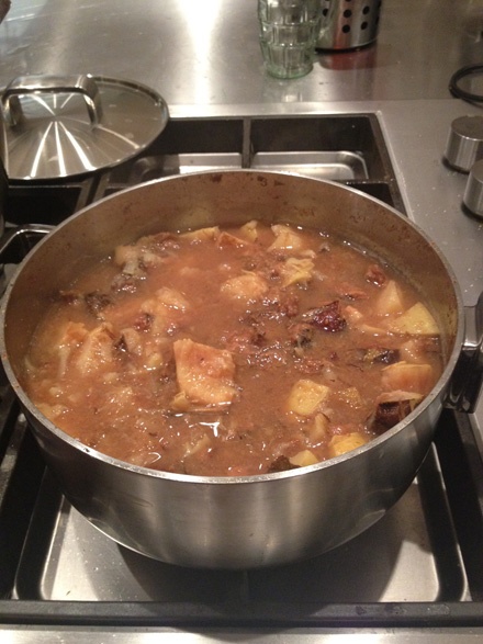 straining fruit that is softened by cooking, through a muslin bag