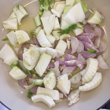 Fennel and shallots in a pan