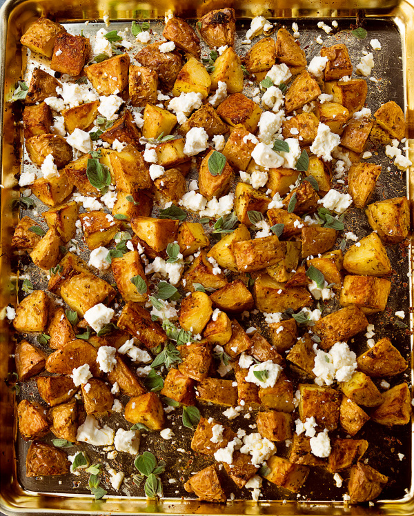 Image of Nigella's Garlicky Roast Potatoes with Oregano and Feta